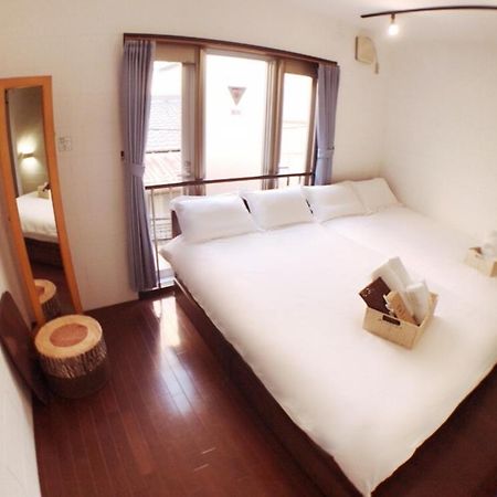 Osaka Sinsei Guest House Bagian luar foto