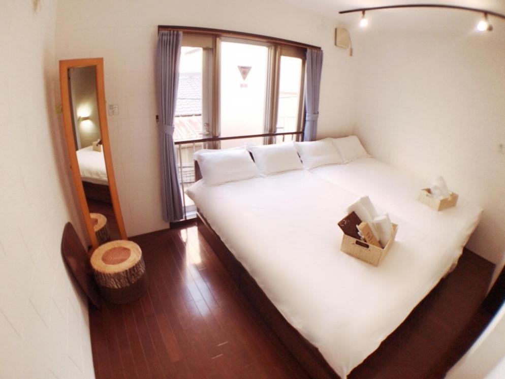 Osaka Sinsei Guest House Bagian luar foto